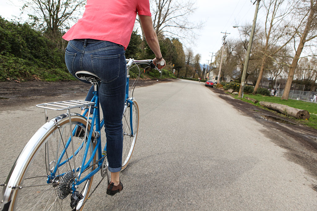 Jill St. John rides a bike