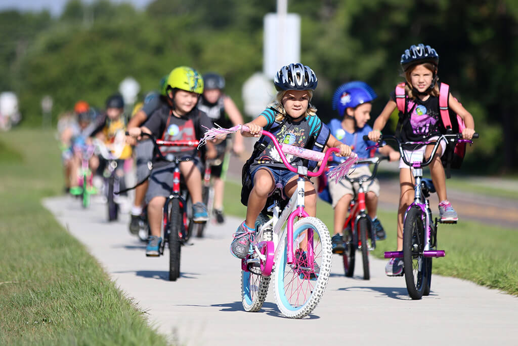 children riding bikes