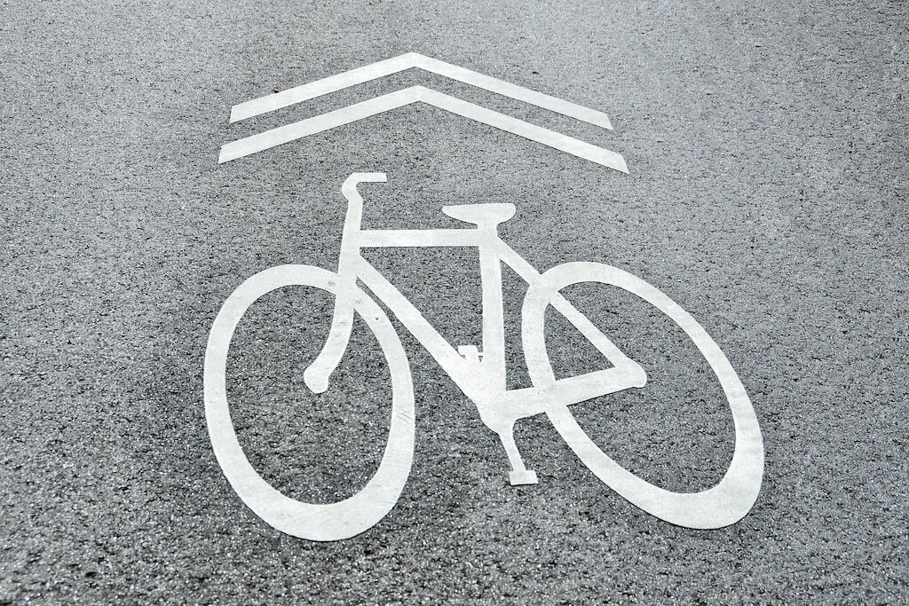 Sharrows used to make sense in theory, but are now useless and possibly dangerous in practice