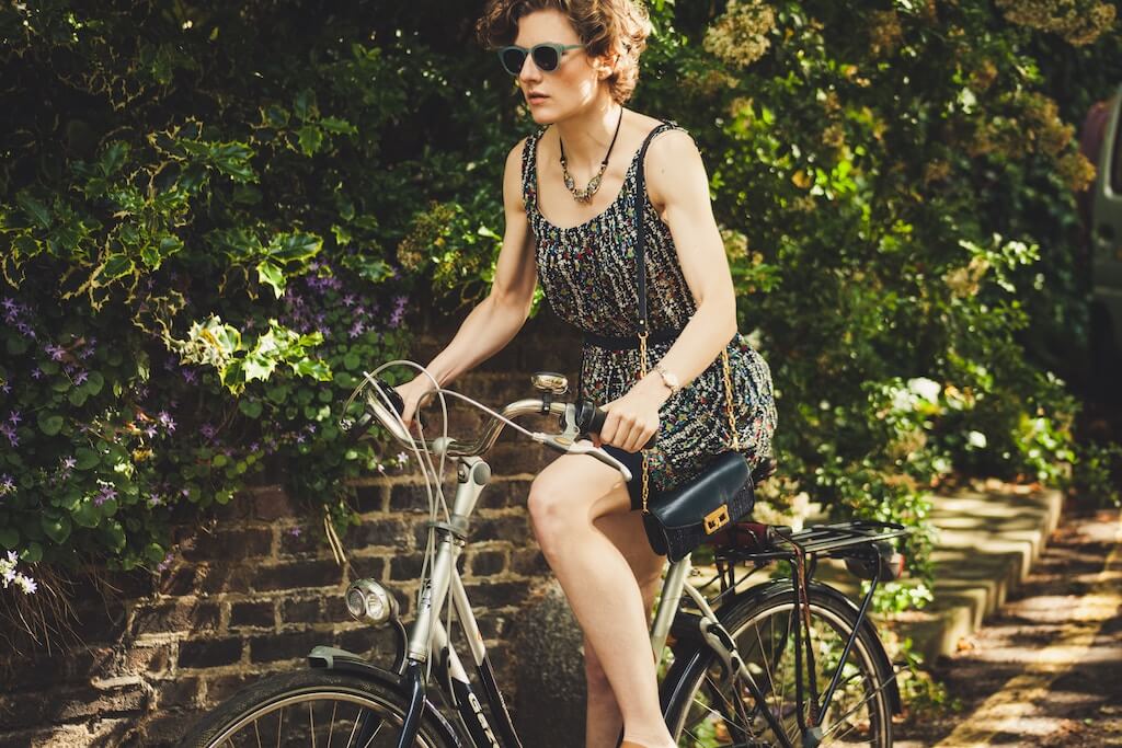 Yes, you can definitely bicycle to work in a spring dress, and here’s how