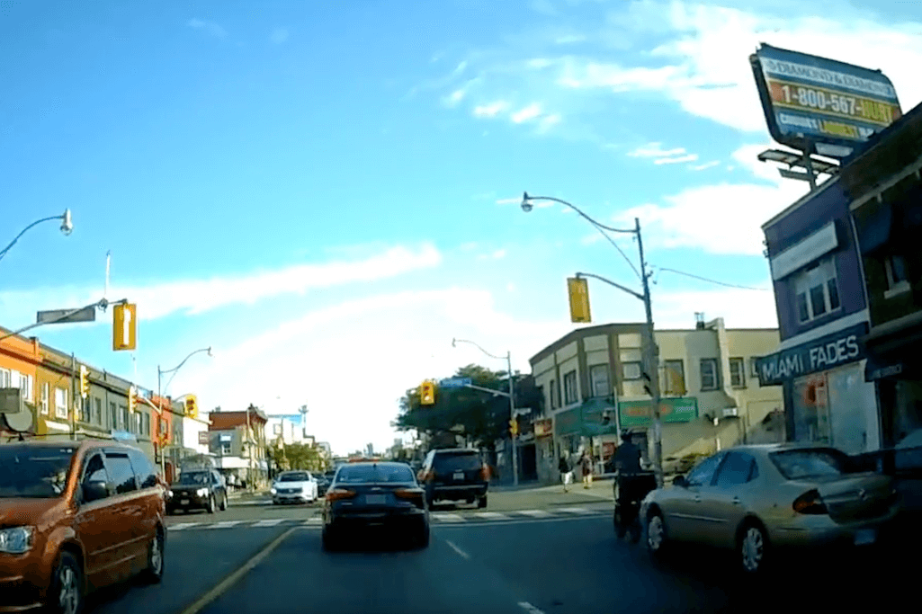 Dash Cam Captures Footage of Person Driving Directly into a Toronto Cyclist