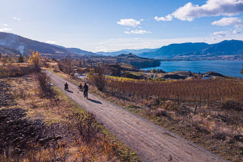 Adaptive trail riding along the Kettle Valley Rail Trail in Penticton ideal for Mother's Day bicycle routes.