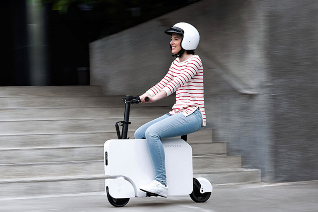 Honda's quirky new Motocompacto e-scooter folds up like a suitcase
