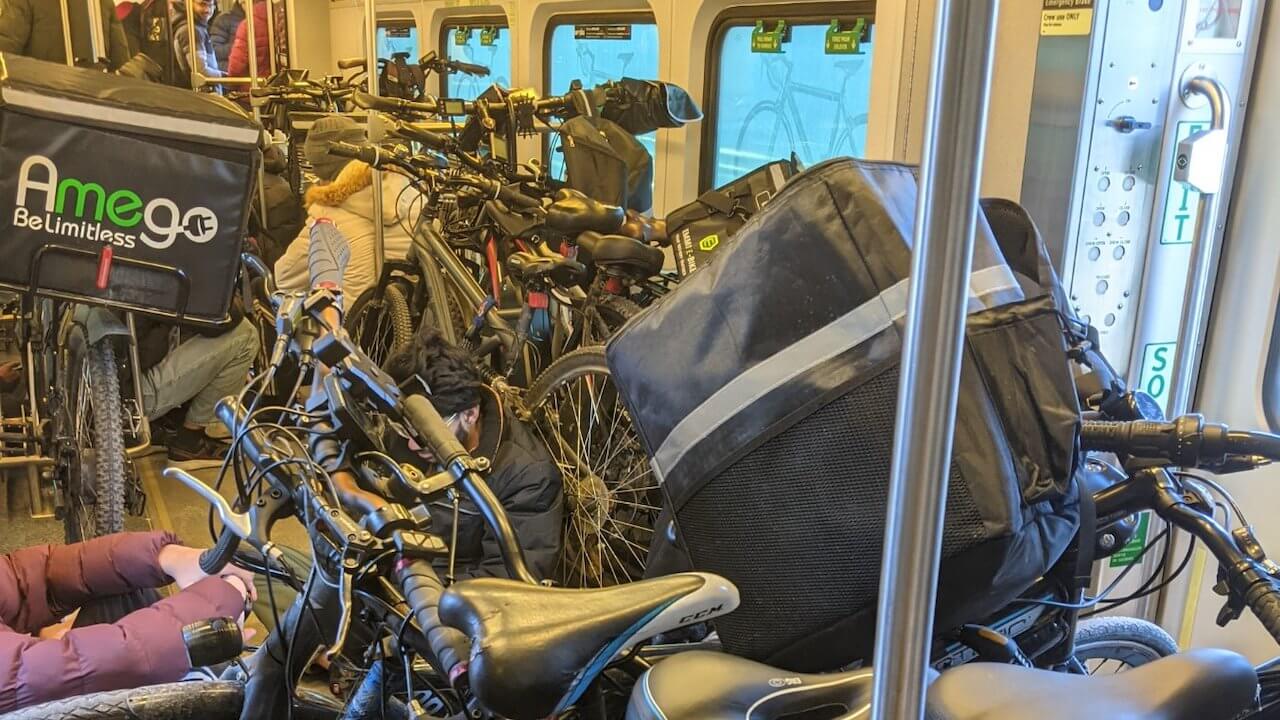 Is the overcrowding of delivery bikes making commuter trains in this city unsafe?